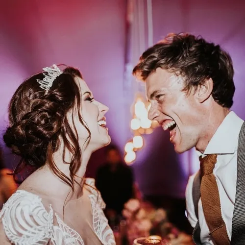 Famous couple Amalia Uys and her husband smiling and dancing to The DJ Company
