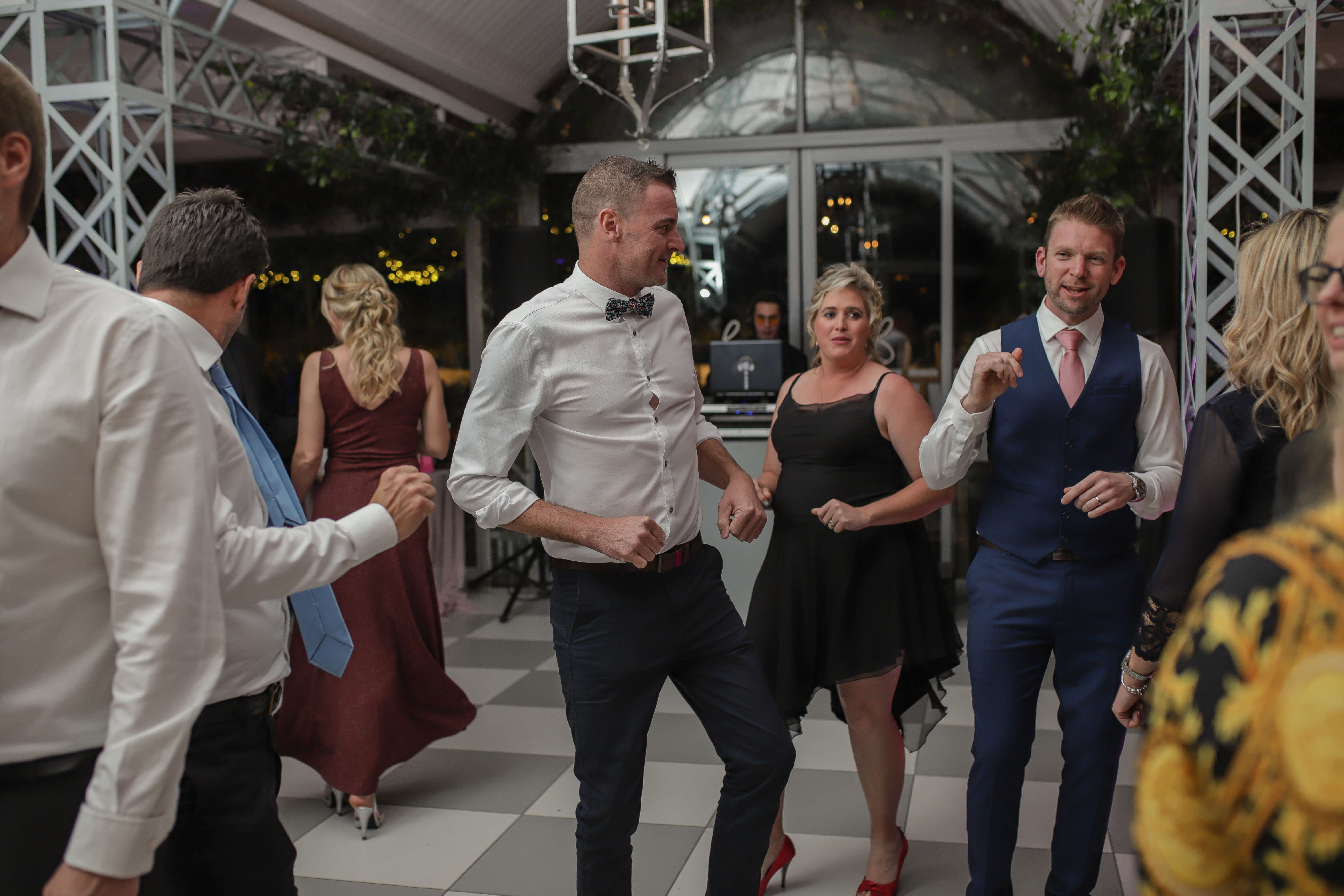 A man dancing in the middle of the dance floor to the best golden oldies.