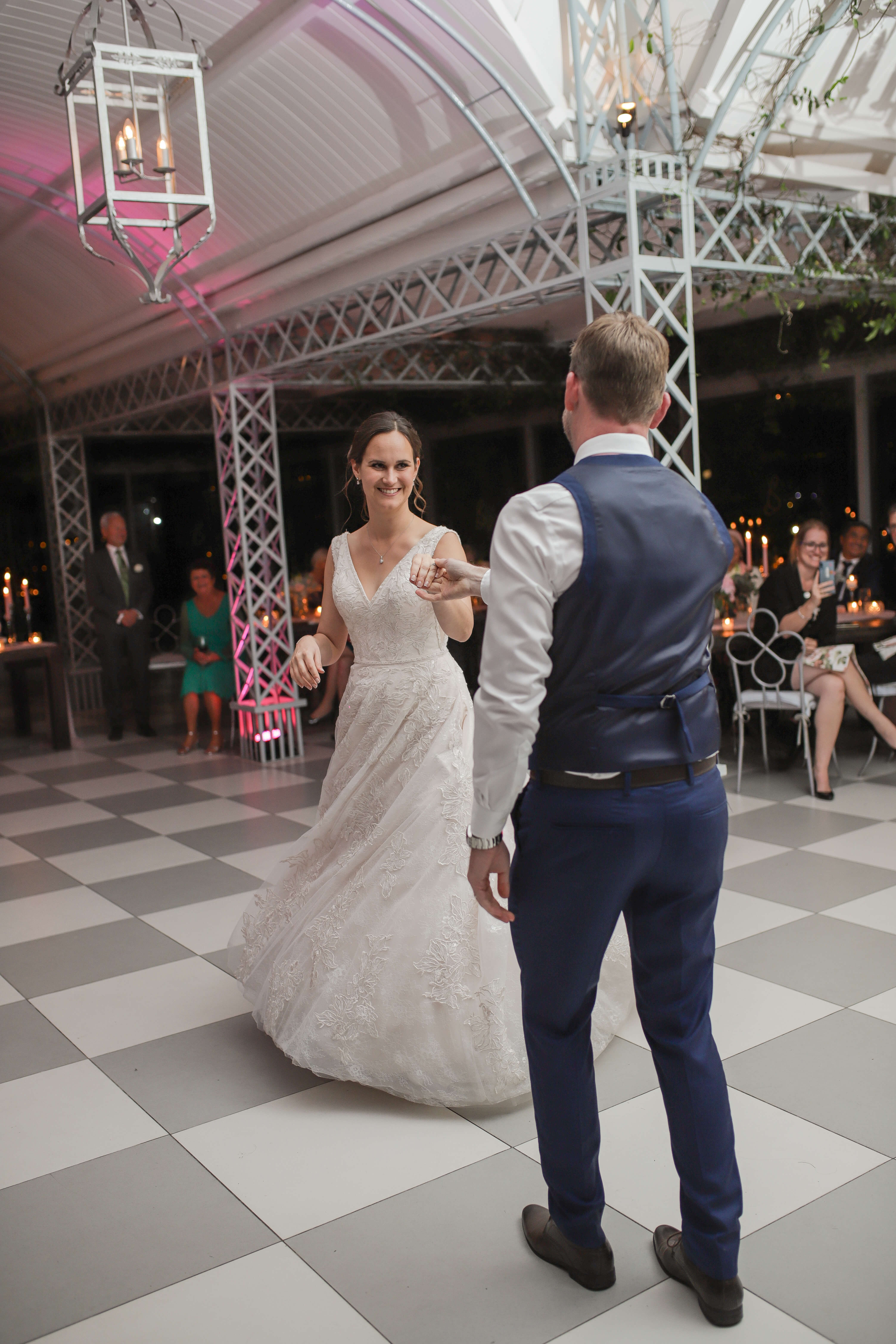 Newly wed couple dancing their first dance to an amazing song.