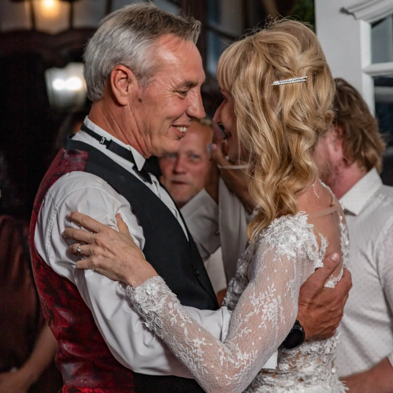 Cindy and Trevor smiling face to face as they slow dance at their Casa Labia wedding in Muizenberg