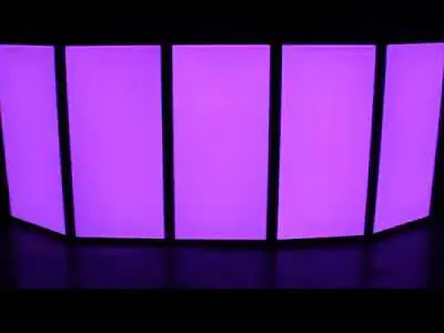 Five-panel white DJ facade backlit in purple